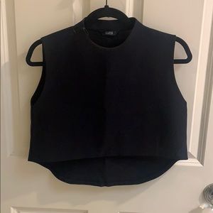 100% polyester crop high low black top